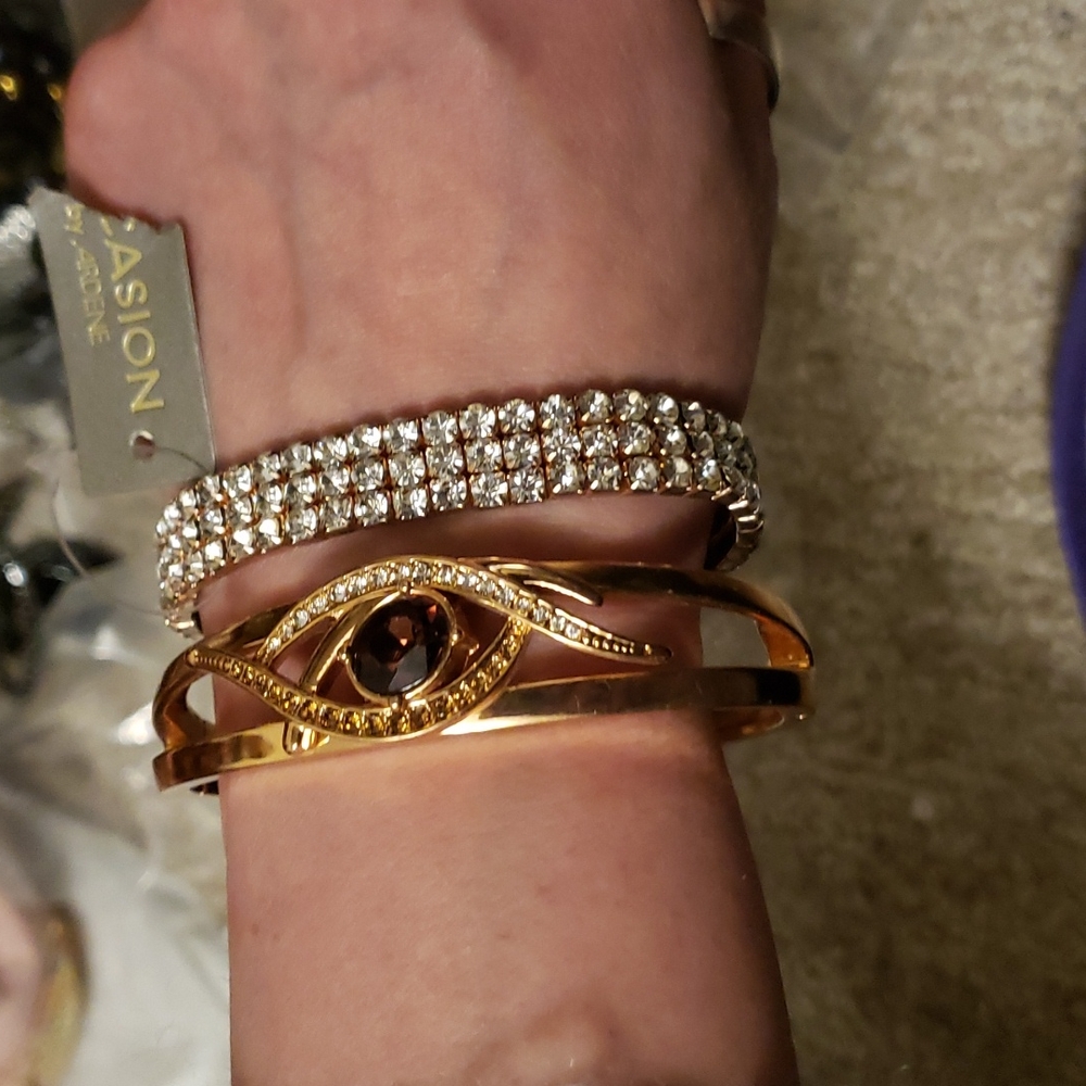 2 rose coloured bracelets one w/tag